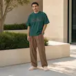 تیشرت مردانه باکسی نخ پنبه طرح گرافیکی ساحلی پرسیسکا