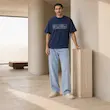 تیشرت مردانه باکسی نخ پنبه طرح گرافیکی ساحلی پرسیسکا
