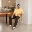 تیشرت مردانه باکسی نخ پنبه طرح گرافیکی آبمیوه پرسیسکا