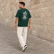 تیشرت مردانه باکسی نخ پنبه طرح گرافیکی آبمیوه پرسیسکا