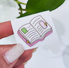 استیکر‌ نیو کتاب میخونم