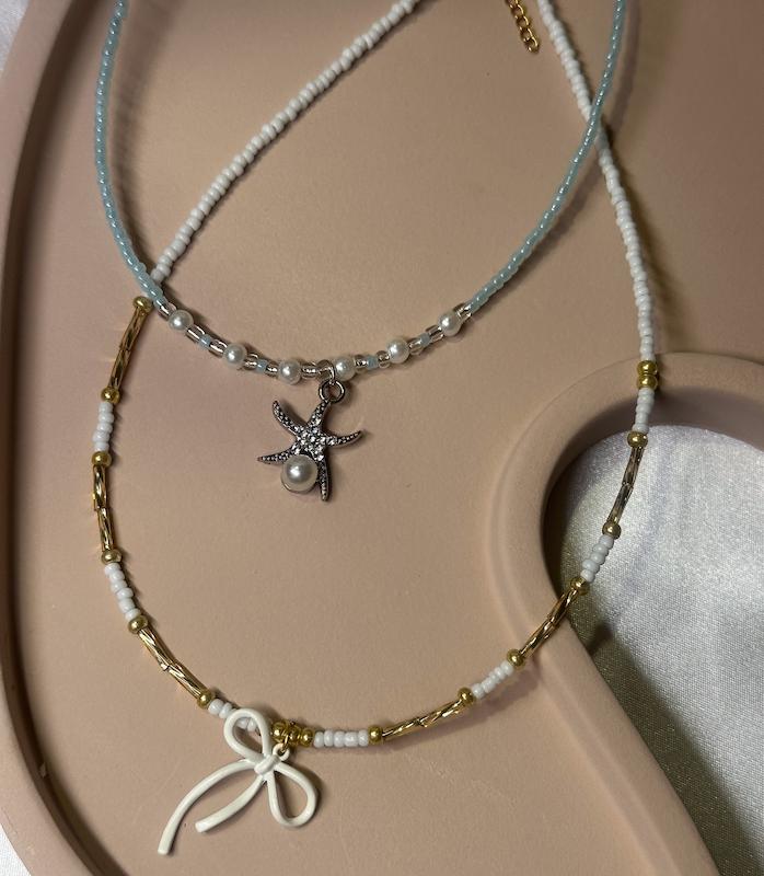 گردنبند پروانه‌ای سفید