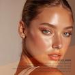 کرم درخشان کننده و مرطوب کننده صورت بیوکسین Bioxcin مدل Gold On Skin 