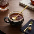 قاشق چایی خوری سر گرد طلایی یونیک پلاس