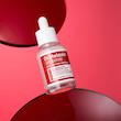 آمپول آستاگزانتین دکتر ملاکسین برطرف کننده کک مک و ضد لک و روشن کننده  Dr.Melaxin Astaxanthin Brightening Ampoull