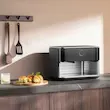 هواپز دو محفظه‌ ای شیائومی مدل Dual Zone Air Fryer 10L MAF-D1001 با ظرفیت 10 لیتر، تنظیم دما و زمان لمسی مجزا، 9 حالت پخت پیش‌فرض و توان 2700 وات برای پخت بدون روغن هم‌زمان دو نوع غذا