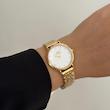 ساعت زنانه دنیل ولینگتون گرد طلایی صفحه سفید نگینی کد ۹۱۴