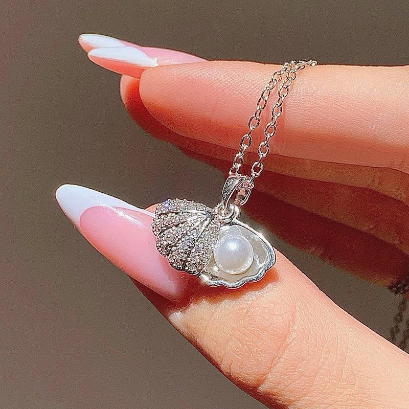 گردنبند صدف دوکفه‌ای🐚