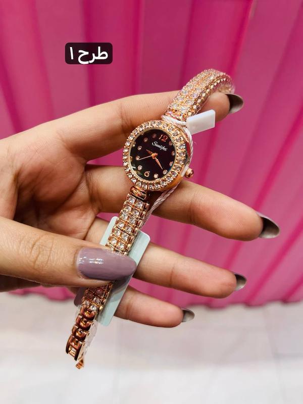 ساعت نگین دار طلایی