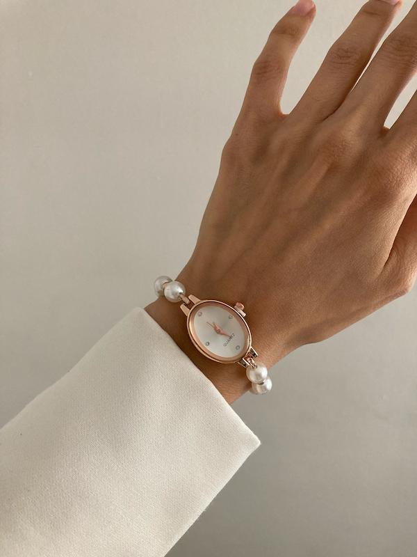 ساعت مرواريدي بيضي