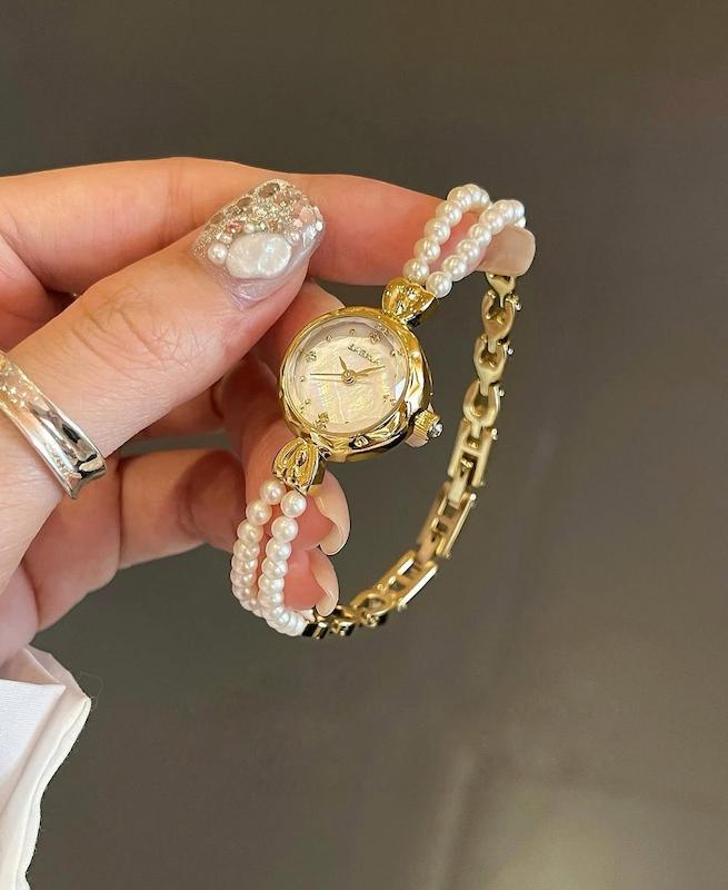 ساعت مروارید خانوم‌