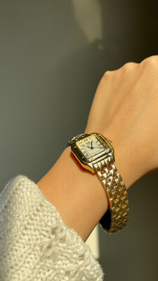 ساعت کارتیه طلایی