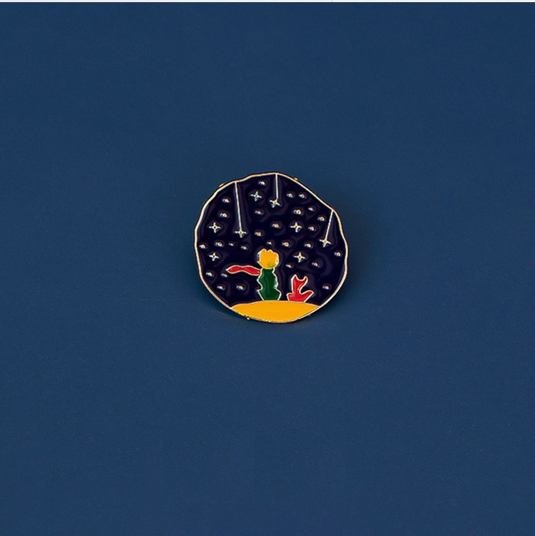 پین شازده کوچولوی سرمه ای