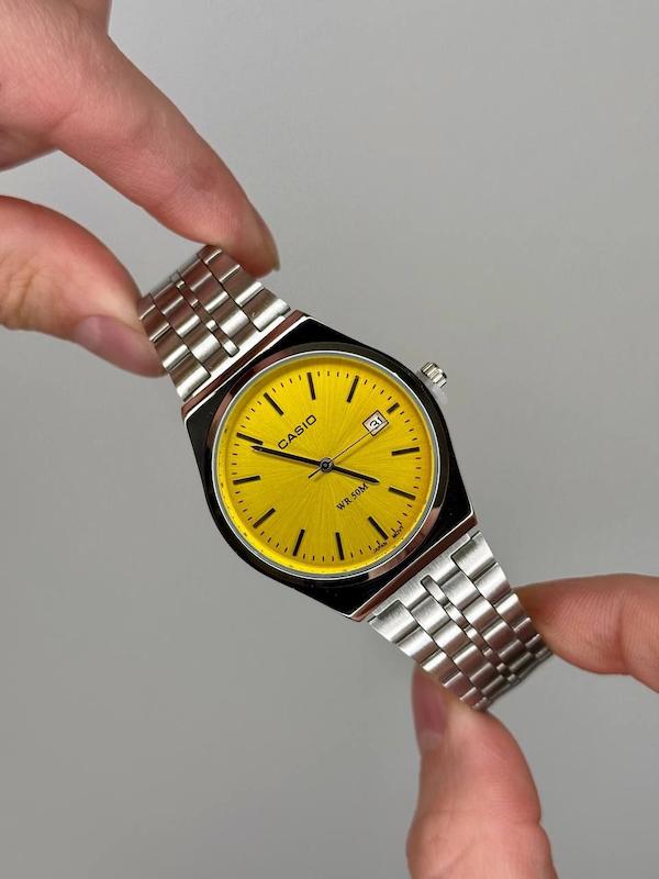 ساعت مچی کاسیو Casio مدل کلاسیک ساده صفحه زرد گرد | گاد فادر 