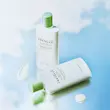 ضدآفتاب تسکین‌دهنده تی‌تریکا سنتلا ماداگاسکار اسکین 1004 (50 میل)🌱 | SKIN1004 Madagascar Centella Tea-Trica Soothing Sun Milk