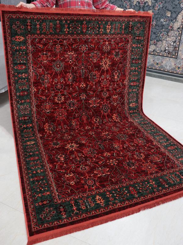 فرش بلوچی زمینه لاکی و سبز 700شانه برند کرامتیان کد 5108A