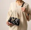 کیف شیک مشکی طلایی با بند زنجیری و چرمی