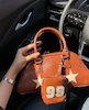 کیف دستی و دوشی چرمی عسلی