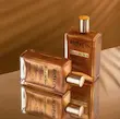 روغن مرطوب کننده و شاین صورت و بدن و مو بیوکسین Bioxin مدل Gold On Skin حجم 100 میل