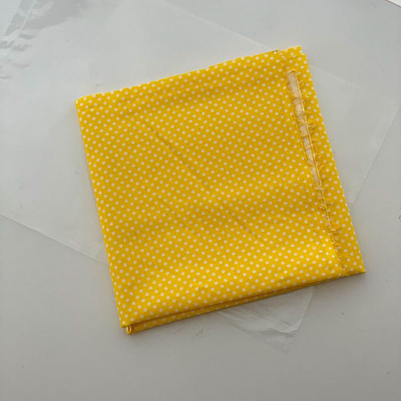 پارچه زرد خال خالی