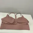 نیم‌تنه ورزشی زنانه بدون بر مدل Vital Fit W گل بهی پشت
