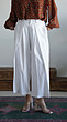 white pleated pants