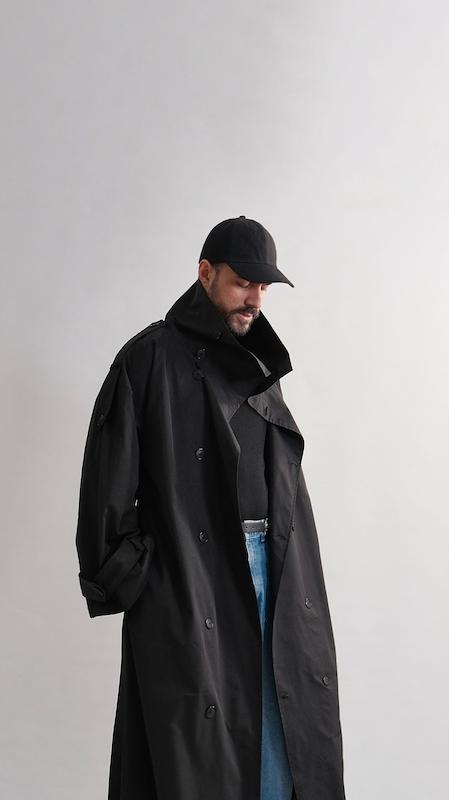 high collar black trenchcoat