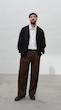 brown straight-leg pleated pants