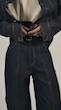 dark blue denim trousers