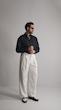 white pleated straight leg pants