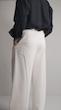 white pleated straight leg pants