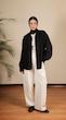 white pleated straight leg pants
