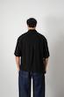 black pleated poloshirt