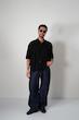 black pleated poloshirt