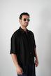 black pleated poloshirt