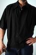 black pleated poloshirt