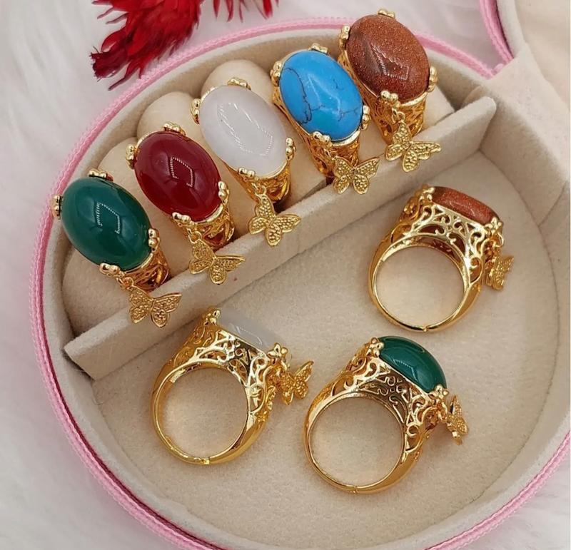 انگشتر طرح سنگ با اویز پروانه