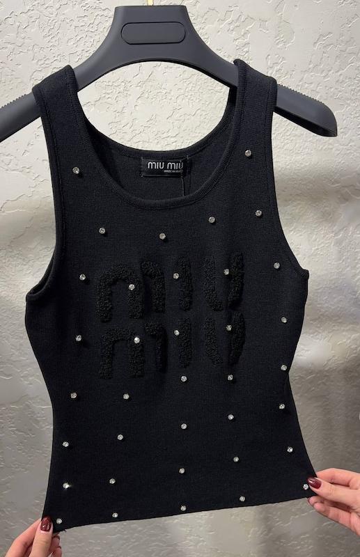 MiuMiu tops 