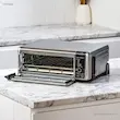 درب باز آون توستر نینجا مدل SP101 و نمایش سینی‌های داخلی.