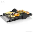 گریل TFB4431V بوش در حالت باربیکیو ۱۸۰ درجه با غذاهای متنوع روی صفحات صاف و شیاردار آن.