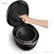 مولتی کوکر فیلیپس مدل HD4539 با درب باز و دستی در حال اشاره به دریچه بخار داخلی.