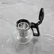 قوری شیشه ای چای ساز گوسونیک مدل GST-766 با درب باز و فیلتر استیل قابل مشاهده.