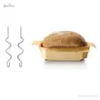 سری خمیرزن (dough hooks) همزن برقی بوش مدل MFQ25200 در کنار یک نان تازه پخته شده.