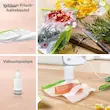 اینفوگرافیک آلمانی نمایش عملکرد پمپ وکیوم همزن دستی بوش مدل MFQ364V0 برای وکیوم کردن ماهی و سبزیجات.