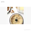 نمای بالا از آجیل خرد شده داخل ظرف خردکن گوشت کوب برقی بوش مدل MS6CA4150.
