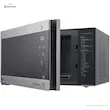 درب باز مایکروویو ال جی مدل MH8265CIS و نمایی از راهنمای برنامه‌های پخت حک شده روی بدنه داخلی.