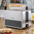نمودار گرافیکی ابعاد دقیق توستر بوش مدل TAT7S25 (ارتفاع ۱۸۴، طول ۲۹۲ و عرض ۱۵۵ میلی‌متر).