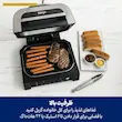 گریل نینجا مدل DG551 با درب باز در حال پخت استیک و سوسیس روی صفحه گریل شیاردار