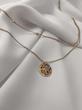 گردنبند دولاین طلایی رنگ با آویز دایره مینیاتوری – مدل «مینیاتور طلایی»