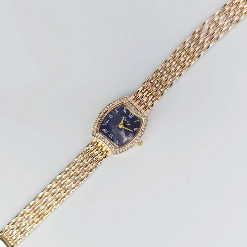 ساعت مچی زنانه باوک Baoke نگین دار با موتور کوارتز صفحه سورمه ای کد 1010